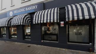 Bakery shop front with illuminated sign tray, frosted vinyl graphics & logos